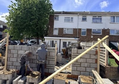 Brookhall team building blockwork walls for a rear extension
