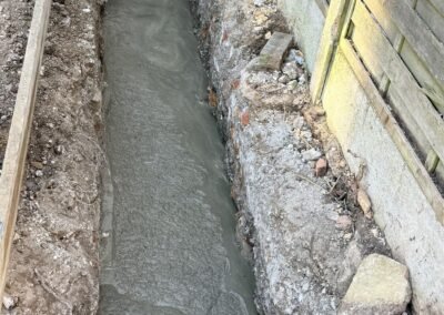 Concrete poured into an extension foundation trench