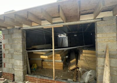 Blockwork extension shell with roof joists and door opening