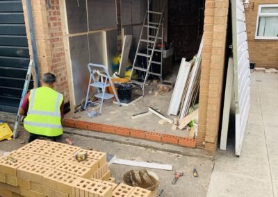 Bricking up the garage door opening for a garage conversion