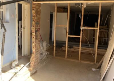 New stud walls forming rooms inside a garage conversion