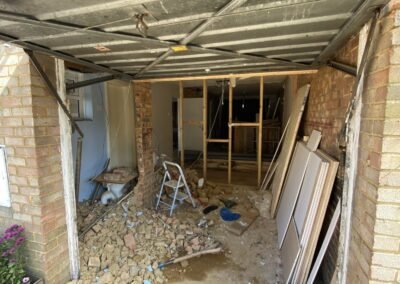 Integral garage being opened up into the house during conversion