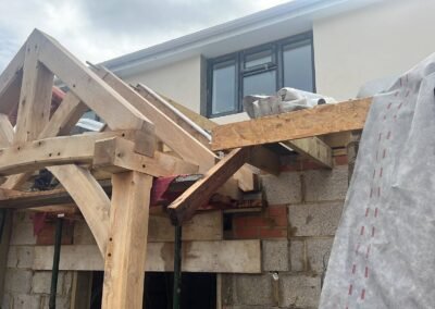 Traditional pegged joints on an oak-frame porch